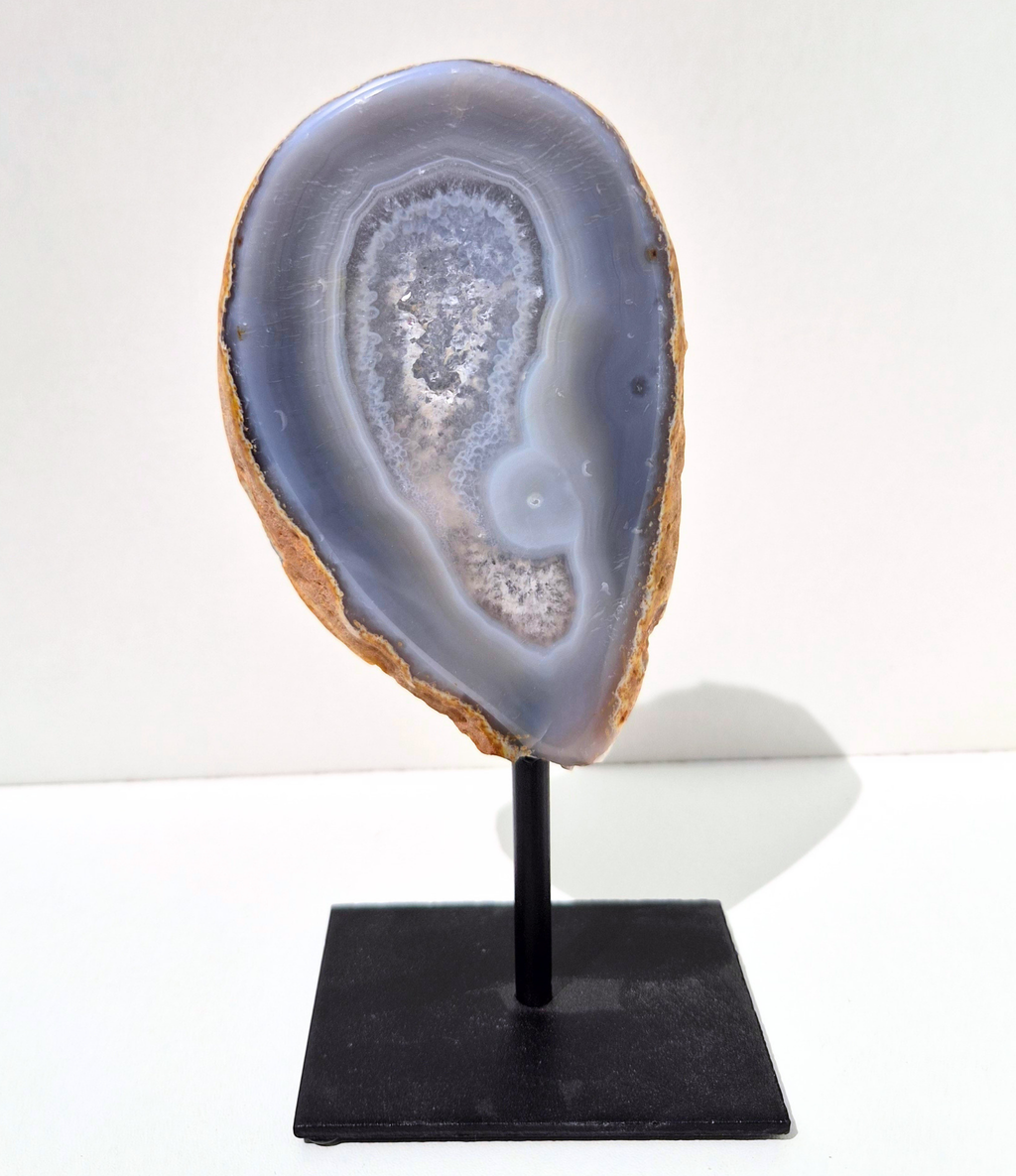 Agate geode on stand
