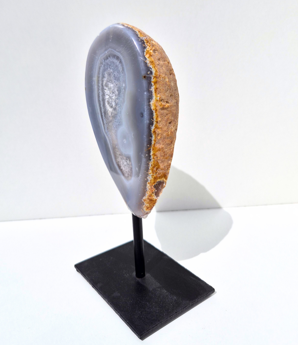 Agate geode on stand