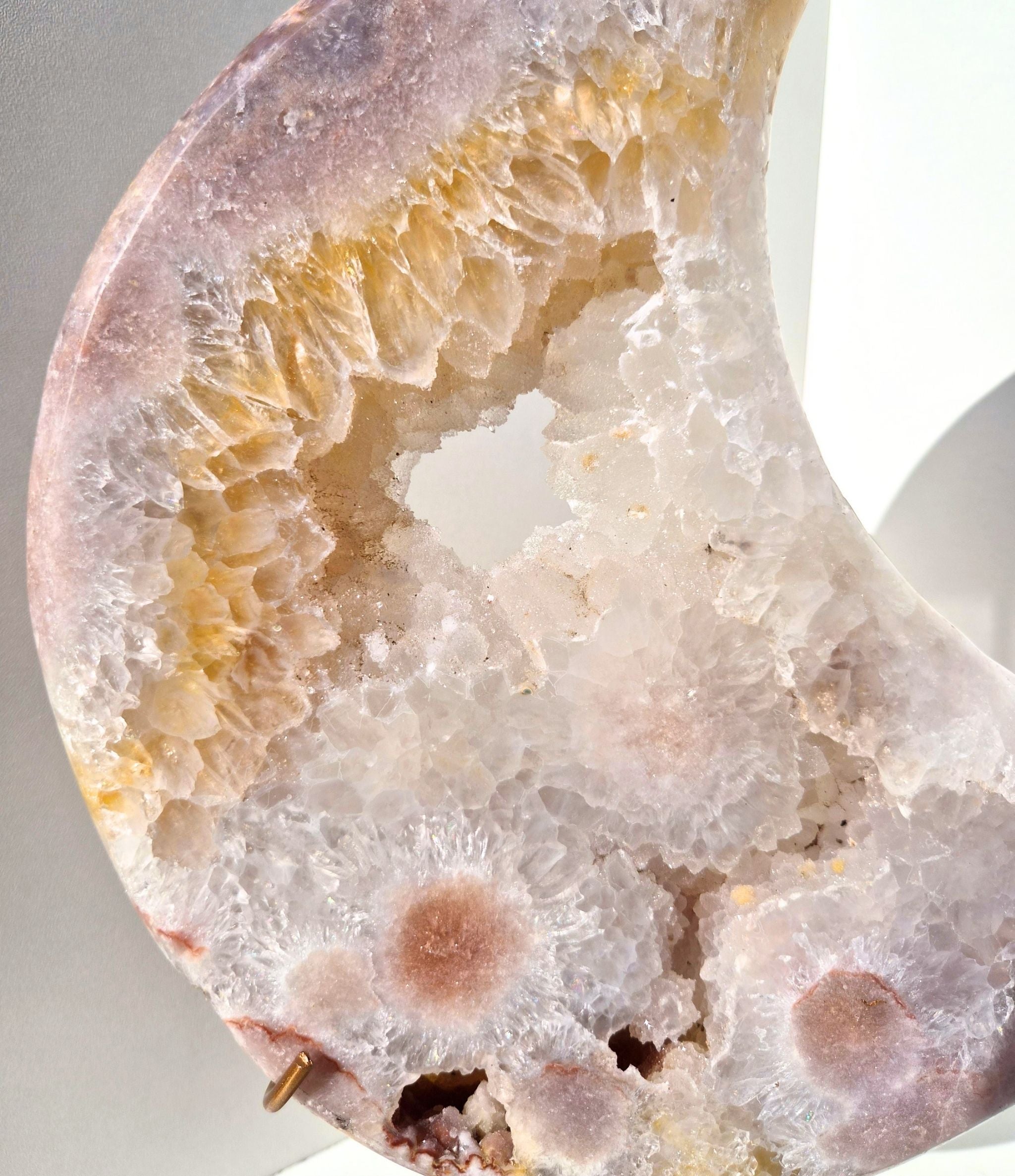 Pink amethyst moon on stand