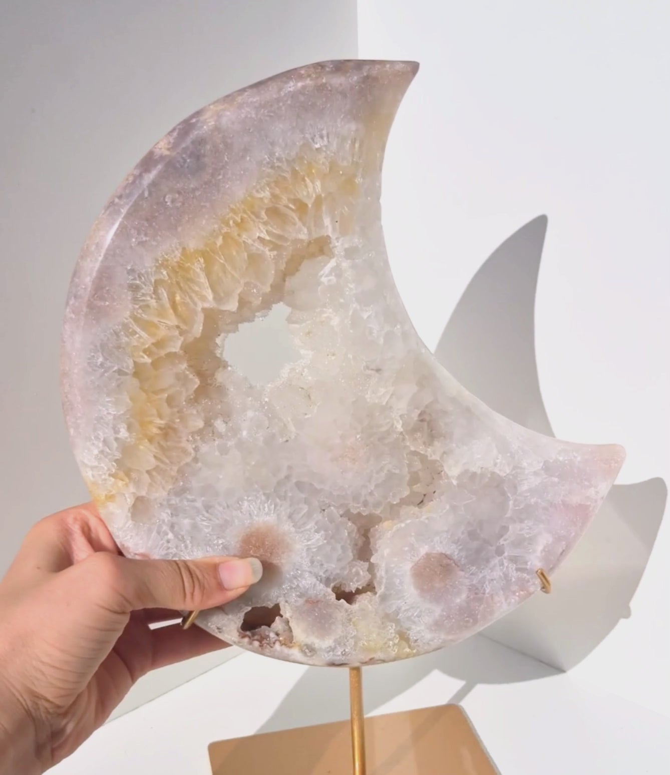 Pink amethyst moon on stand