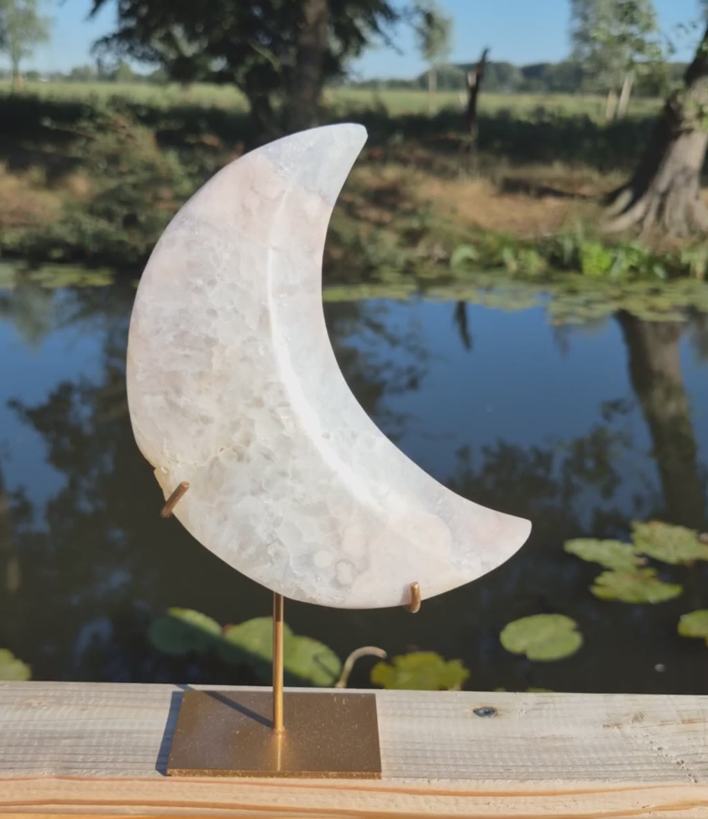 Pink amethyst moon on stand
